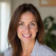 Portrait of Dr. Elise Vance, a serene and empathetic woman.