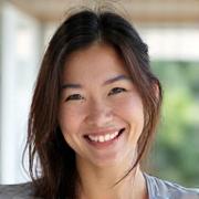 Portrait of Sarah Chen, a vibrant and active-looking woman.